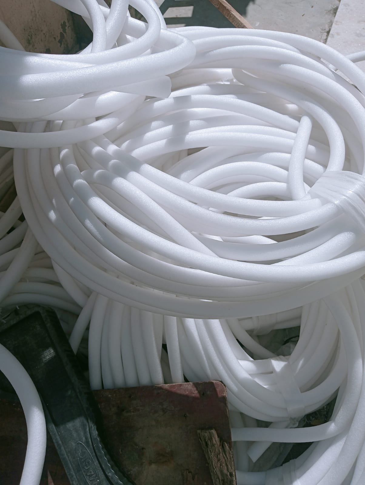 Backer rod coil tied with wire