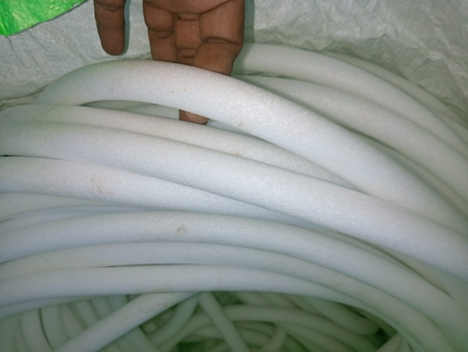 Coiled white backer rod bundle, top view